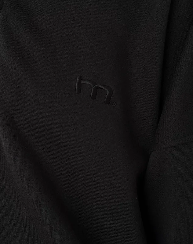 Tirma High Neck Jumper in Tonal Black with M Embroidery